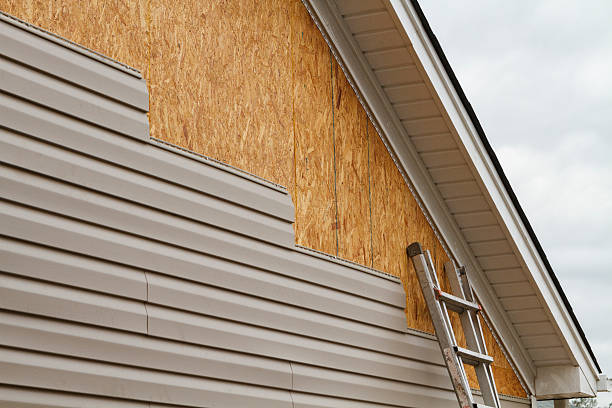 Professional Storm Damage Siding Repair technician working in Hurdle Mills, NC